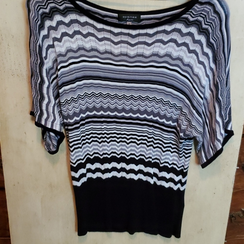Gray, black and white knit top